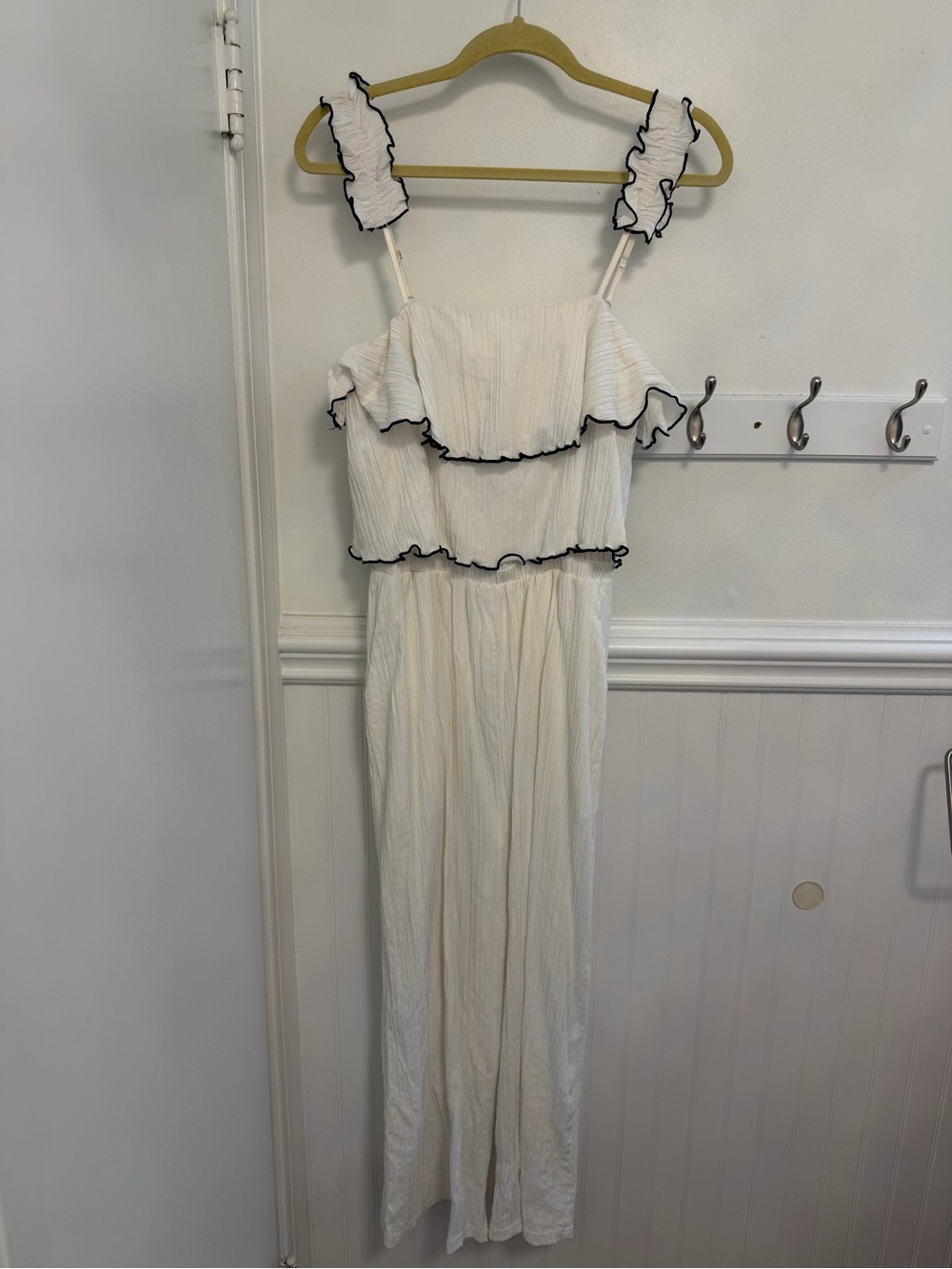 White Ruffle-Strap Jumpsuit with Black Trim